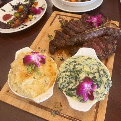 Grilled meat and side dishes.