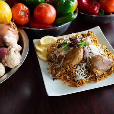 Basmati rice with chicken, spices, fried onions, lemon, and coriander.