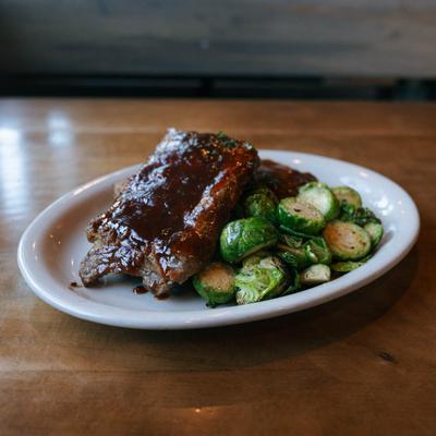 Barbecue ribs with roasted Brussels sprouts.