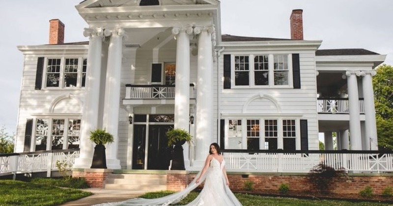 Bride in front of the restaurant