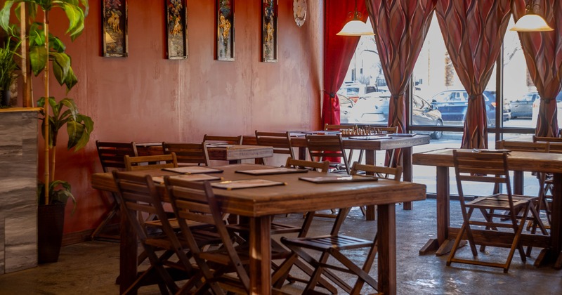 Interior, seating area with wooden tables and chairs