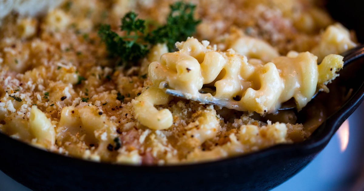 Mac and Cheese topped with breadcrumbs and fresh herbs
