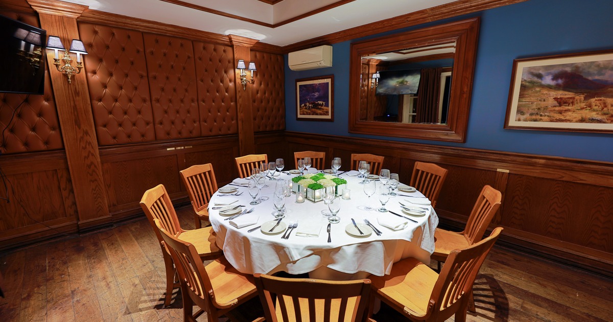 Elegant private dining room with a set round dining table