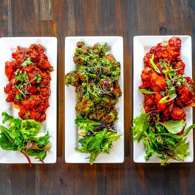 Assorted chicken dishes, top view.