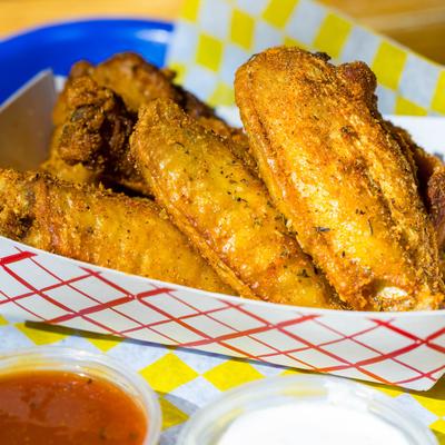 Dry rub wings with dipping sauces.