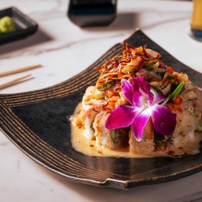 Fiesta Roll served on a plate in a creamy sauce.