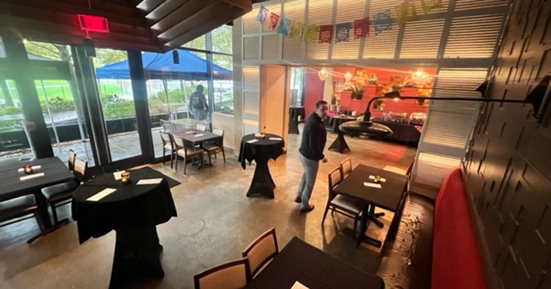 Private space can be expanded to accommodate larger groups and set for sit down or reception style