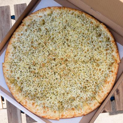 A whole pesto pizza.