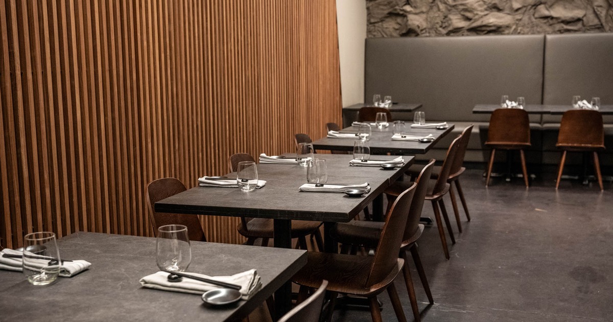 Interior, seating area, tables ready for guests