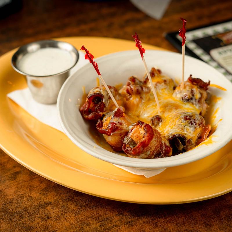Bacon-wrapped tater tots photo