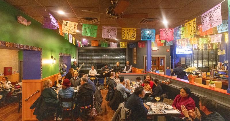Wide view to diner area, guests, diner time