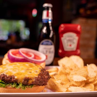 Cheeseburger, chips, and a beer