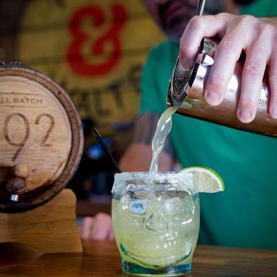 Owner  pouring a cocktail