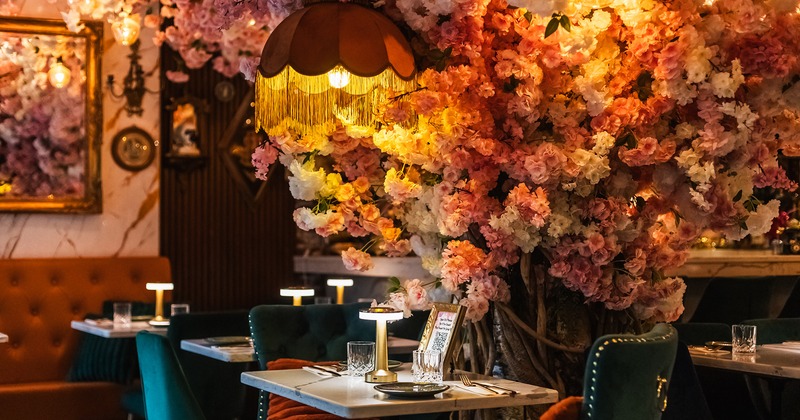 Nicely done interior dining area, flower decoration