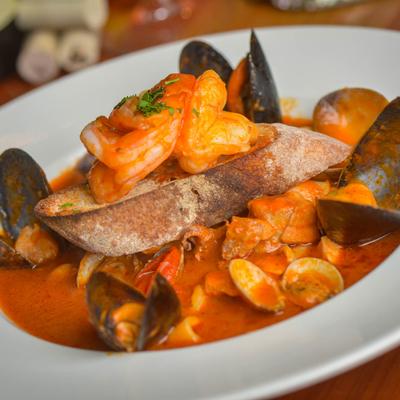 Cioppino, seafood in a tomato garlic broth with toasted bread.