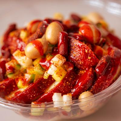 Apple with sweet chili sauce and other ingredients.