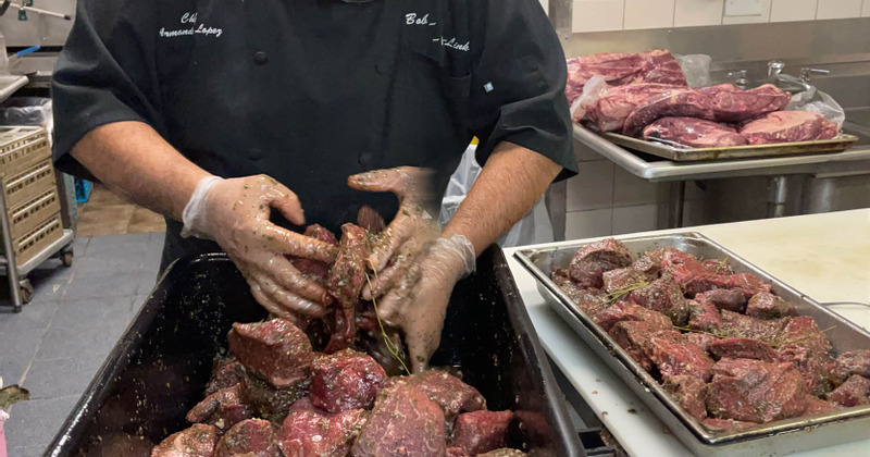 Kitchen, chef working with meat