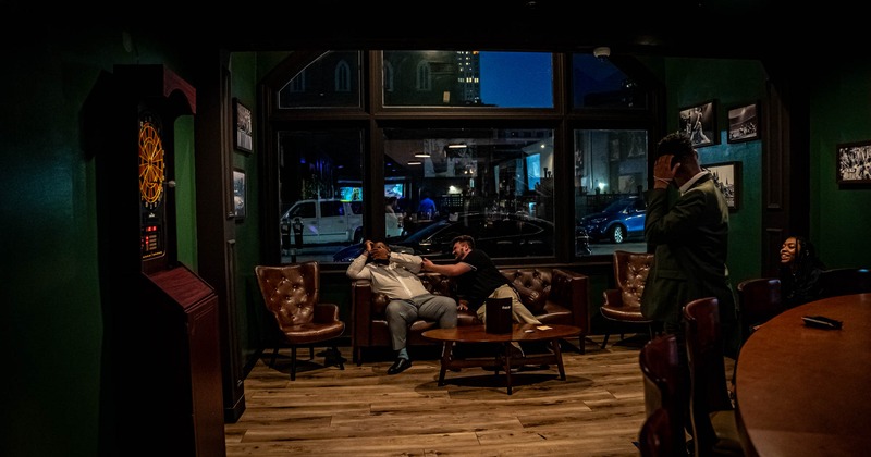 Interior, people at the bar area