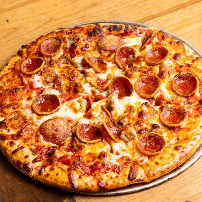 Pizza with sausage and pepperoni.
