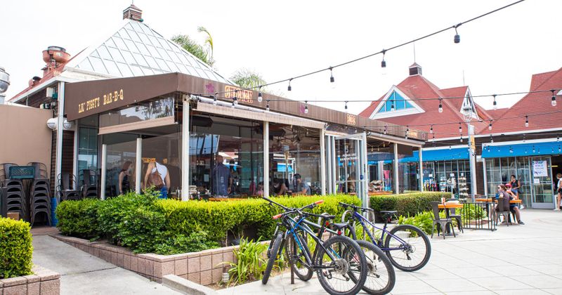 Exterior, side view of the restaurant, a couple of bicycles parked in front of the entrance