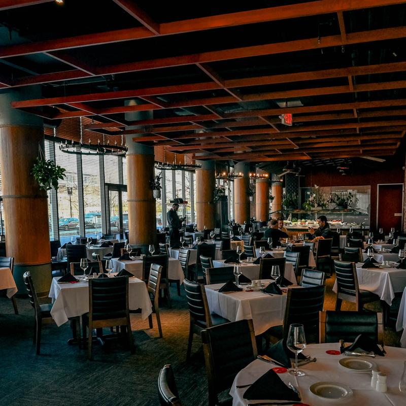 Interior dining area, tables for four people