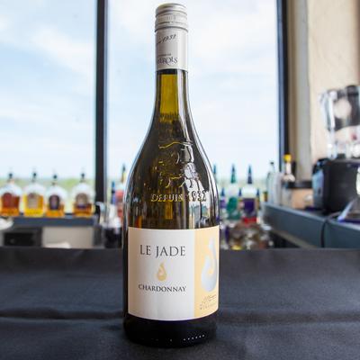 Bottle of white wine displayed on the table.