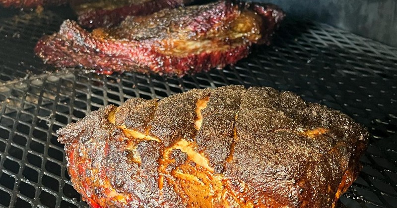 Briskets on a grill