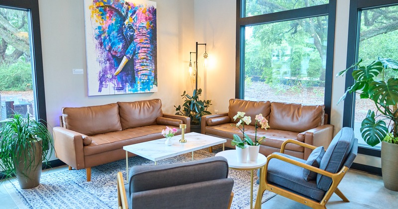 Interior, couch, armchairs and coffee tables