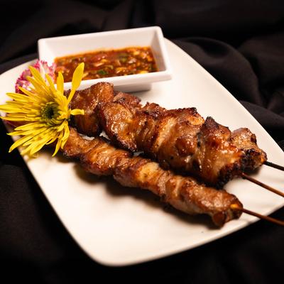 Pork Skewers, with dipping sauce.