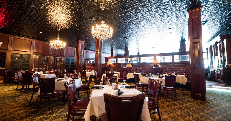 Dining area with set tables prepared for guests