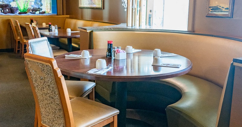 Interior, tables, chairs and curved bench seating