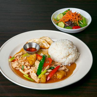Grilled chicken, sauteed with peppers, onions, and pineapple, served with rice and dumplings.