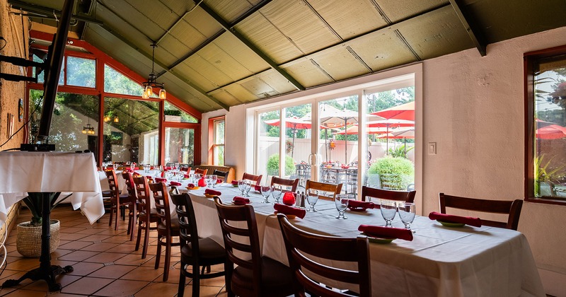 Private room, with a fully set dining table