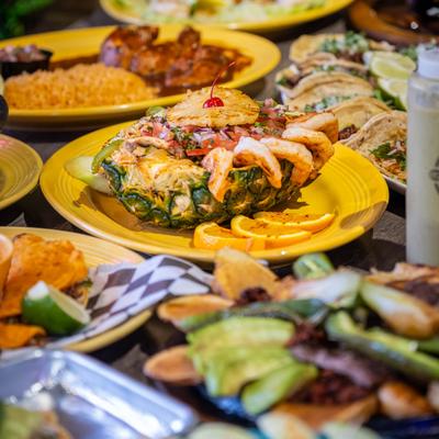 Assorted Mexican dishes on a table.