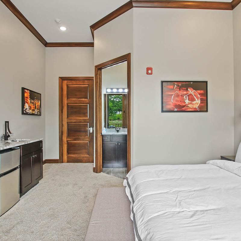 An interior space of a room, a large bed.