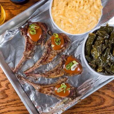Lamb Chops, with mac and cheese and collard greens on the side.