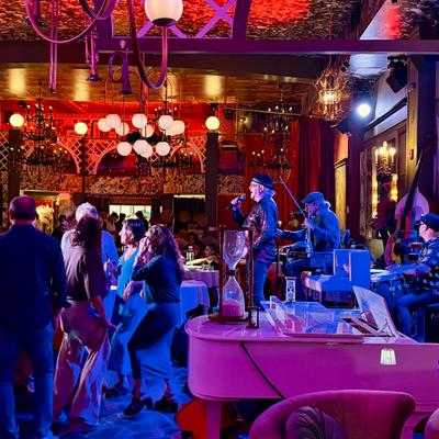 Guests dancing while the band plays.