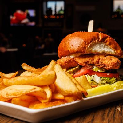 Crispy Chicken Sandwich served with crispy potatoes.