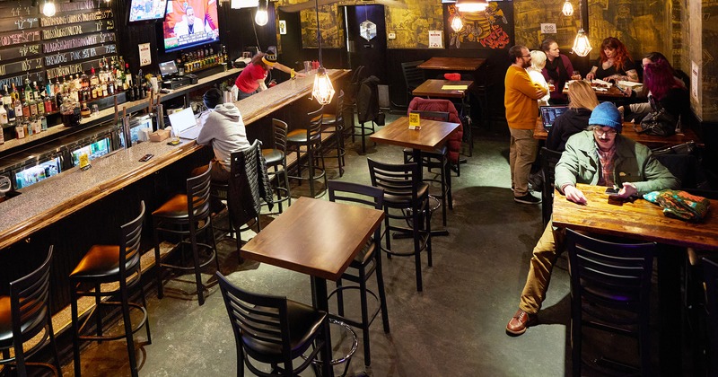 Interior space, bar and seating area with guests