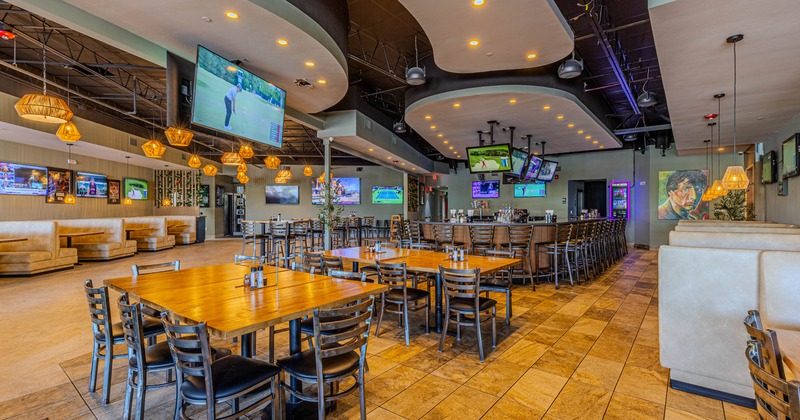 Interior, seating area with a bar in the back