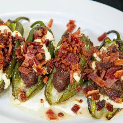 Wagyu Stuffed Jalapenos, topped with bacon bits.