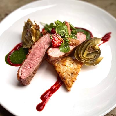Duck meat with vegetables.