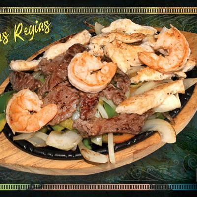 Portion of shrimp and beef fajitas.