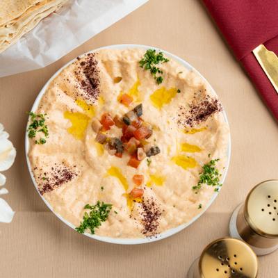 Spicy garlic spread served with pita bread.