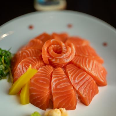 almon sashimi over seasonal sushi rice.
