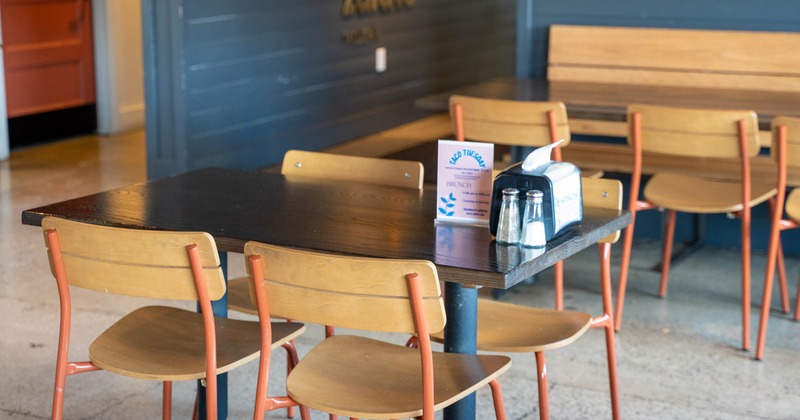 Restaurant interior with wooden tables, chairs