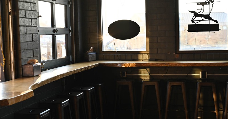 Interior, window table with bar stools