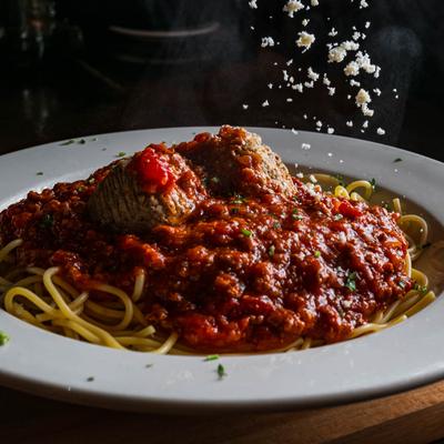Meatballs, meatsauce and spaghetti in perfect harmony!.