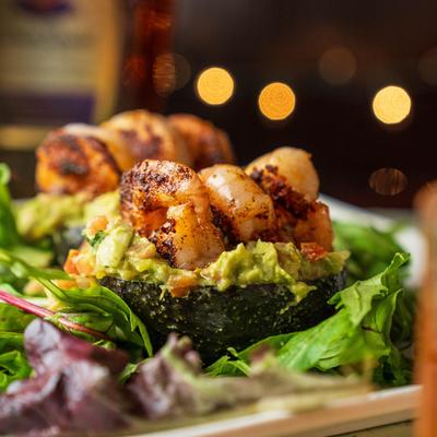 Shrimp and avocado appetizer dish.