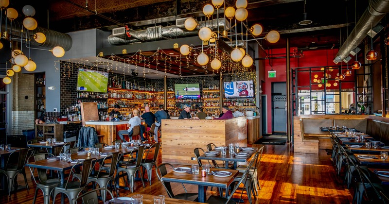 Dining and bar area, TVs on the wall